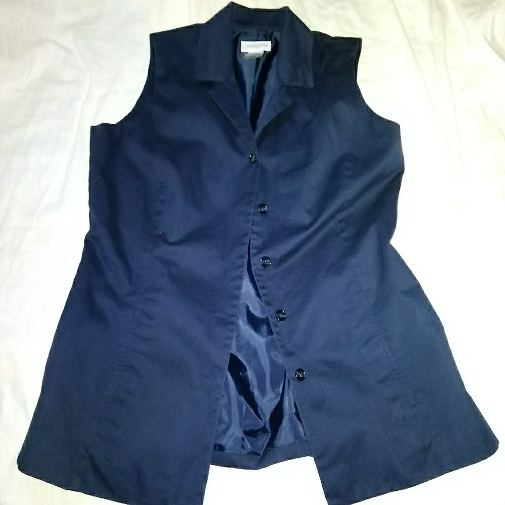 Sale     nice vest top it's a dark blue 5/$20